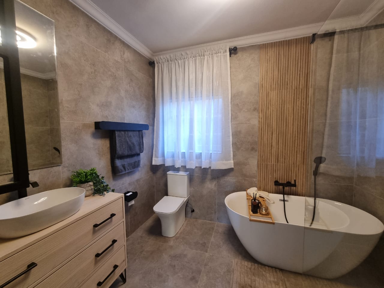 Modern bathroom installation with black finishes in Faerie Glen, Pretoria