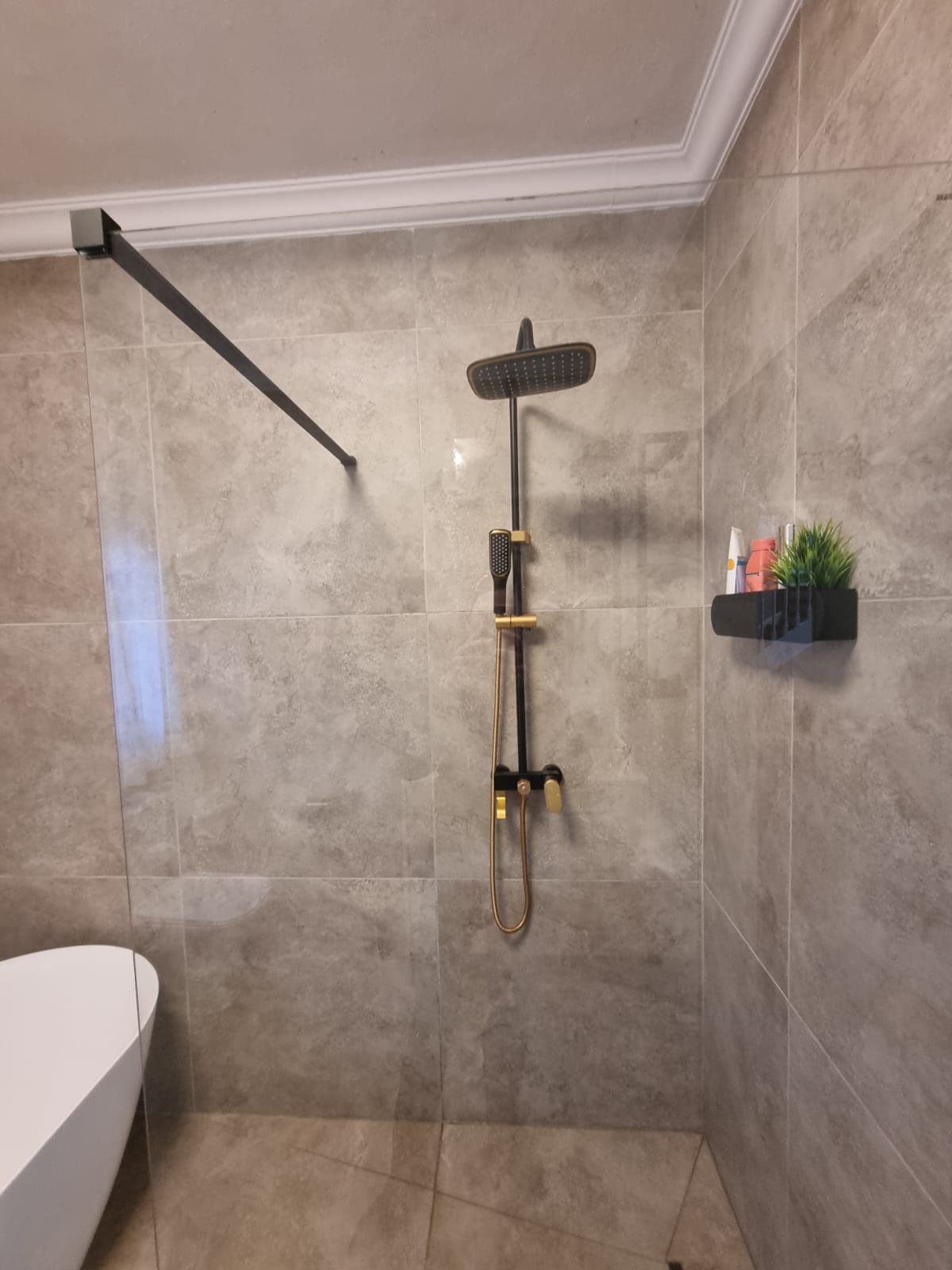Modern bathroom with black finishes in Faerie Glen Pretoria
